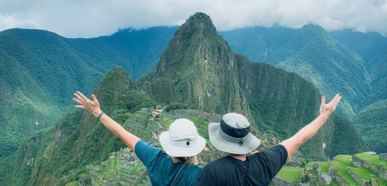 Tourists enjoying the scenic Huayna Picchu mountain viewpoint