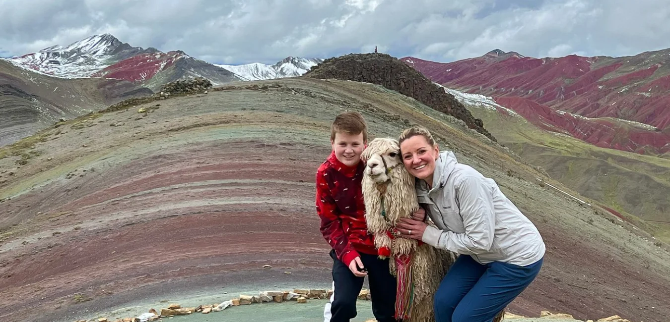 Family at the colorful Palcoyo Mountain viewpoint